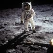 Historic image of an astronaut on the moon during the Apollo mission, showcasing space exploration.